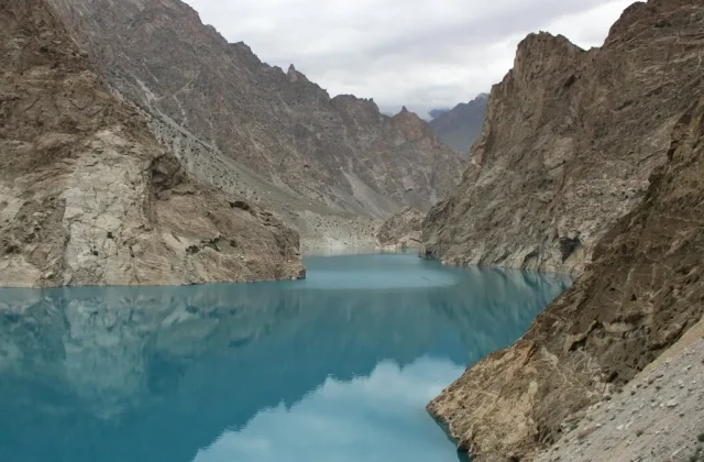 Passu Cones mountain peaks towering above Passu village in Hunza Valley, Pakistan