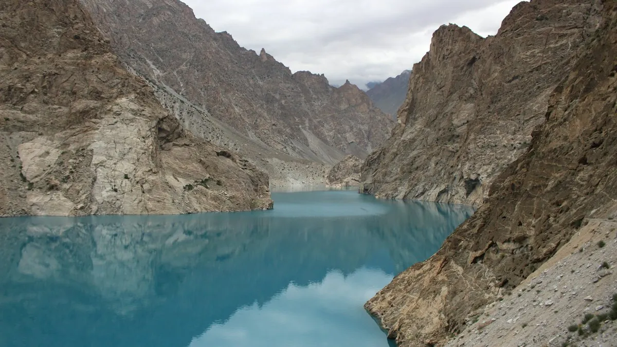 Passu Cones mountain peaks towering above Passu village in Hunza Valley, Pakistan