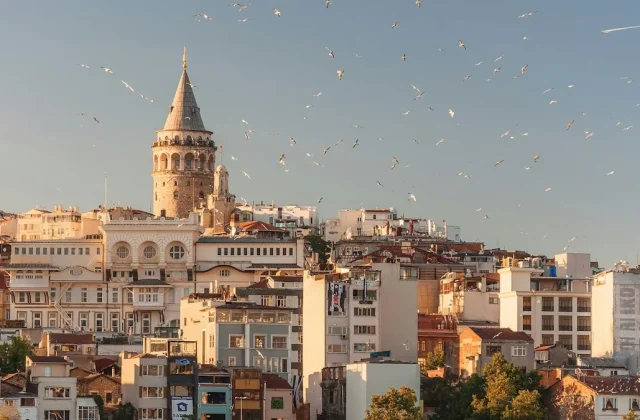 Galata Tower rising against a blue sky in Istanbul, Türkiye — featured image for The Travel Guide's 2026 Istanbul travel guide