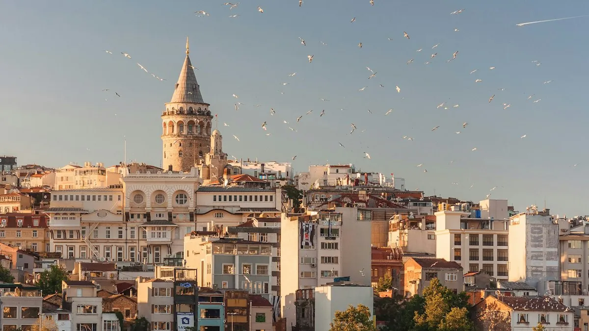 Galata Tower rising against a blue sky in Istanbul, Türkiye — featured image for The Travel Guide's 2026 Istanbul travel guide